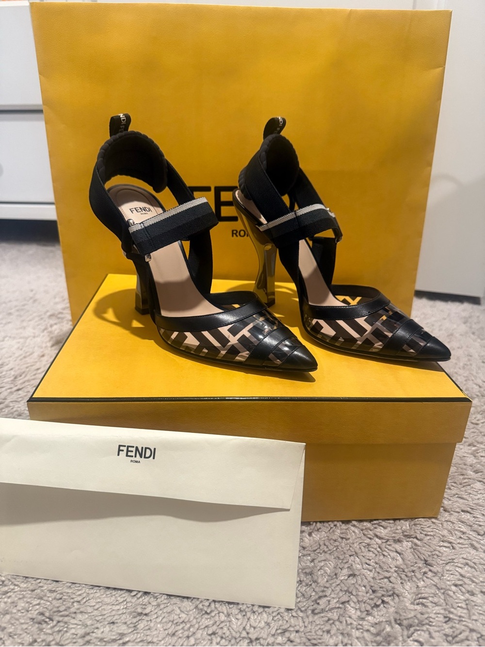FENDI BLACK PVC
MONOGRAM COLIBRI
SLINGBACK HEELS